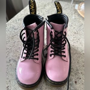 Toddler Dr. Martens size C8. Fit more like a 7. My daughter wore them 4 times.